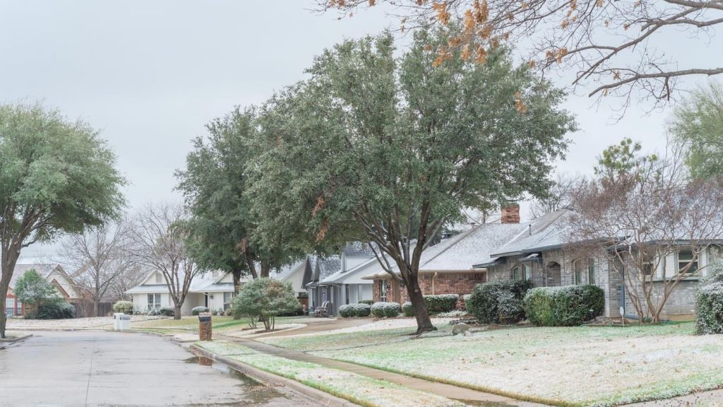 suburban-house-yards-snow Artificial Rain LLC